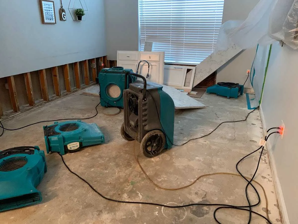 Dehumidifier in flood-cut room for Water Damage Restoration in Roscoe